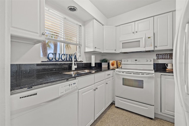 kitchen featuring white cabinetry, white appliances, and sink