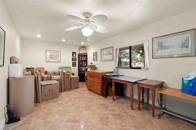 office featuring light tile patterned floors, a ceiling fan, and recessed lighting