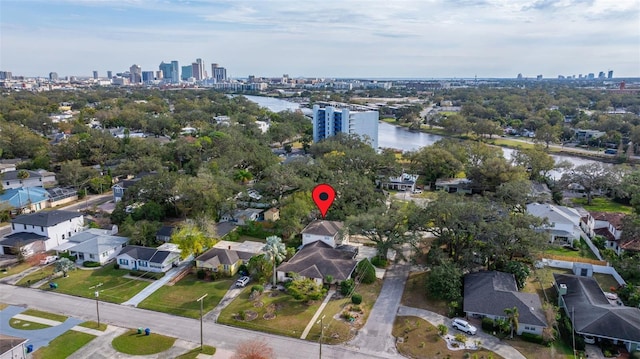 aerial view featuring a water view and a view of city