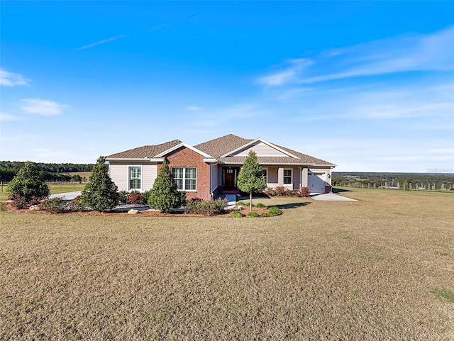 single story home with a garage and a front lawn