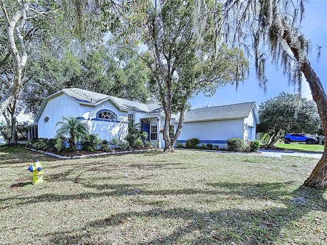 ranch-style home with a front yard