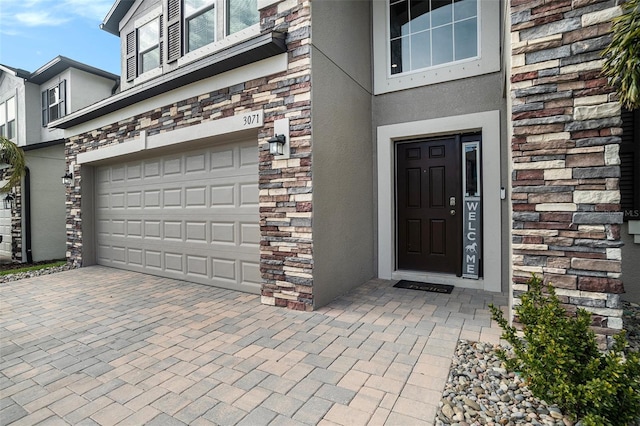 property entrance featuring a garage