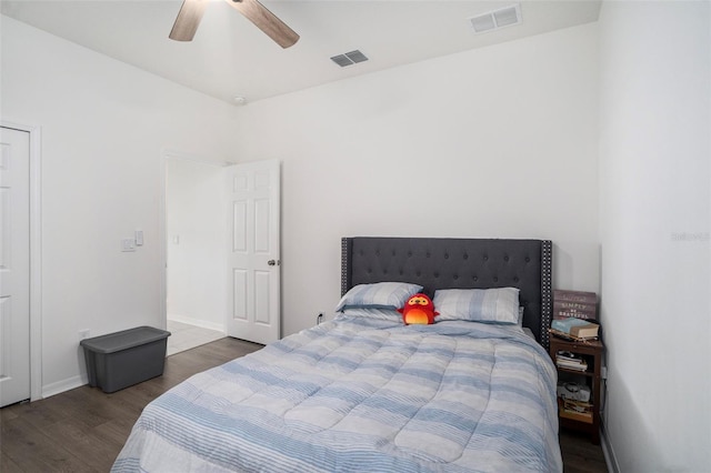 bedroom featuring dark wood-type flooring and ceiling fan