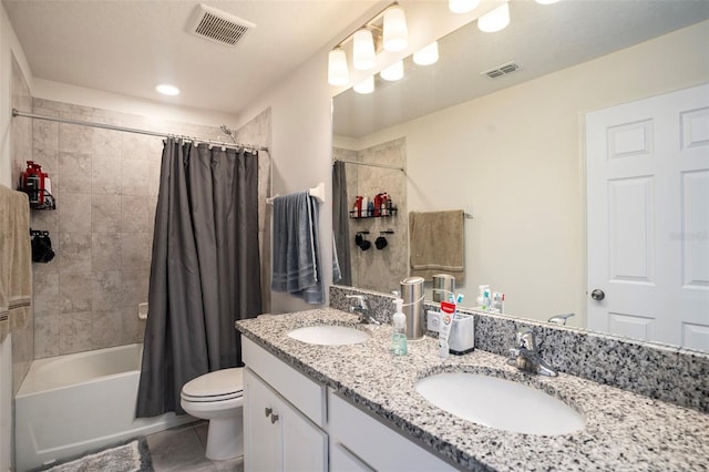 full bathroom with vanity, shower / tub combo, tile patterned flooring, and toilet