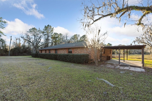 exterior space with a carport