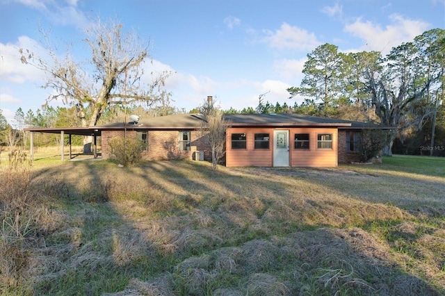 exterior space with a yard