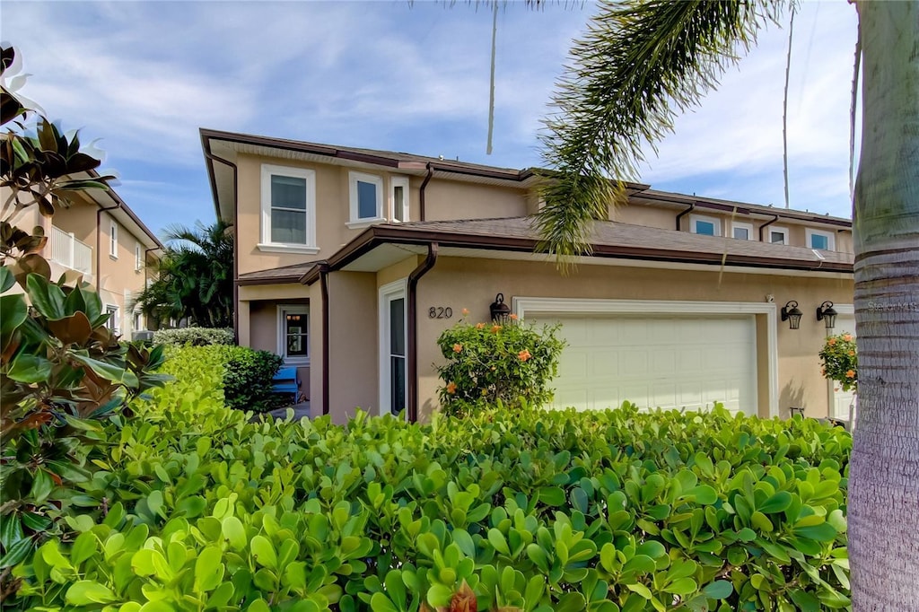 view of front of home with a garage