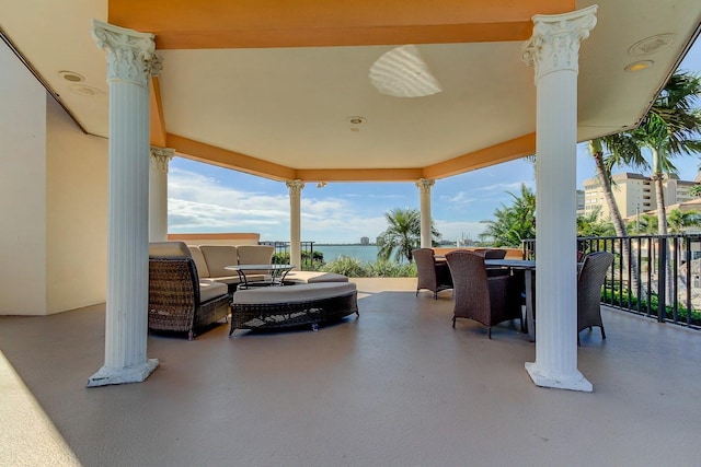 view of patio featuring a water view