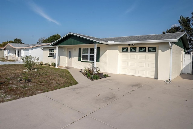 ranch-style home with a garage