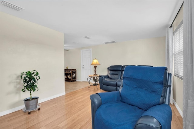 living area featuring light hardwood / wood-style floors