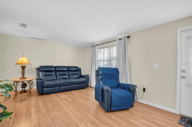 living room featuring light wood-type flooring