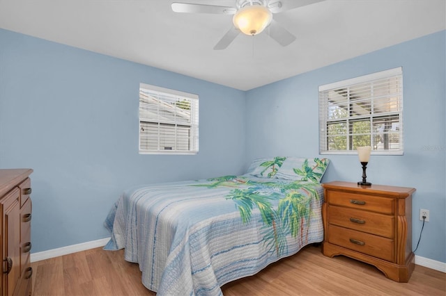 bedroom featuring ceiling fan and light wood-type flooring