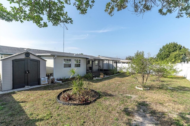 view of yard with a storage shed