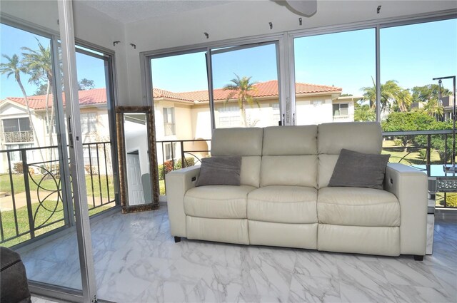 sunroom featuring plenty of natural light