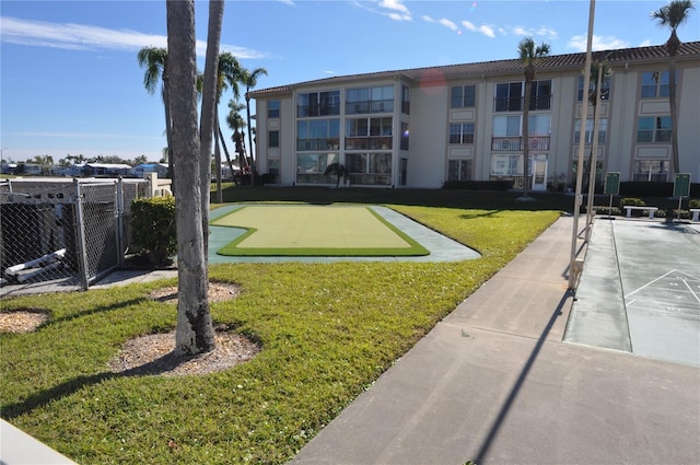 view of community featuring a yard