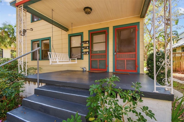 entrance to property with covered porch