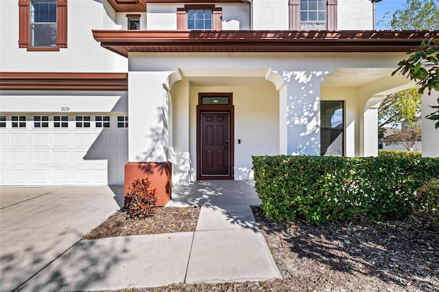 entrance to property featuring a garage