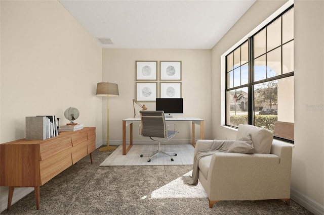 office featuring dark colored carpet