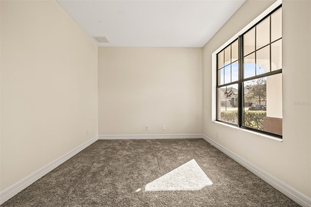 view of carpeted spare room