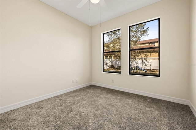 unfurnished room with vaulted ceiling, carpet floors, and ceiling fan