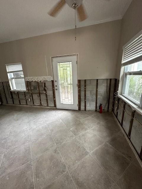 unfurnished room featuring ceiling fan