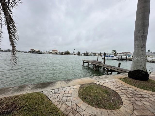 dock area with a water view