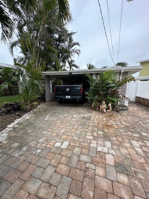 view of front of home with a carport