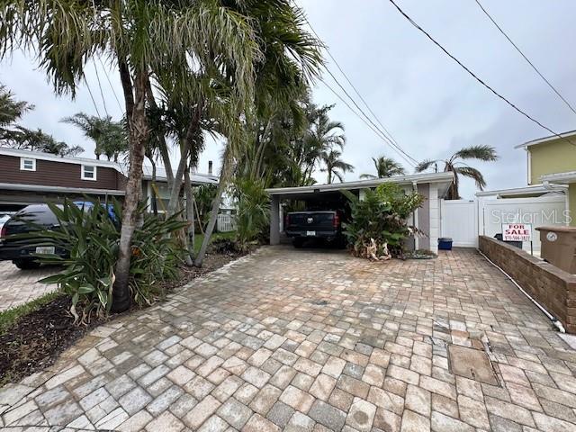 view of patio featuring a carport