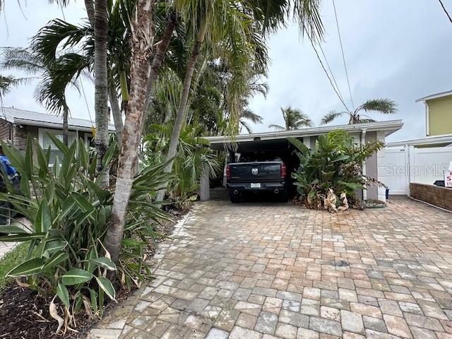 view of parking with a carport