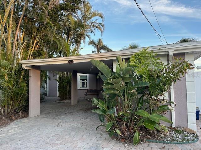 view of front of house with a carport