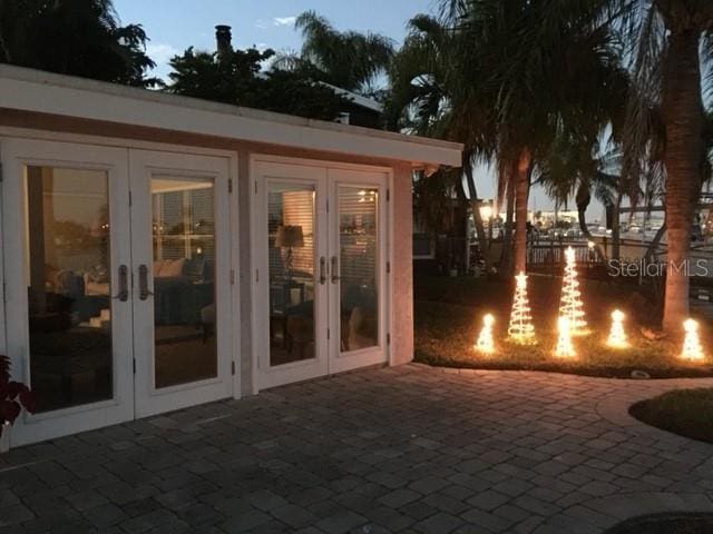 patio terrace at dusk with french doors