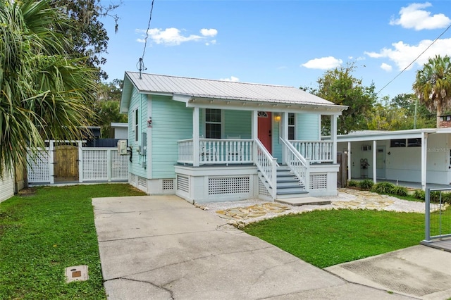 view of front facade with a porch and a front lawn