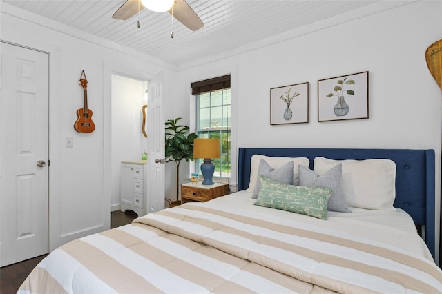 bedroom featuring dark hardwood / wood-style flooring and ceiling fan