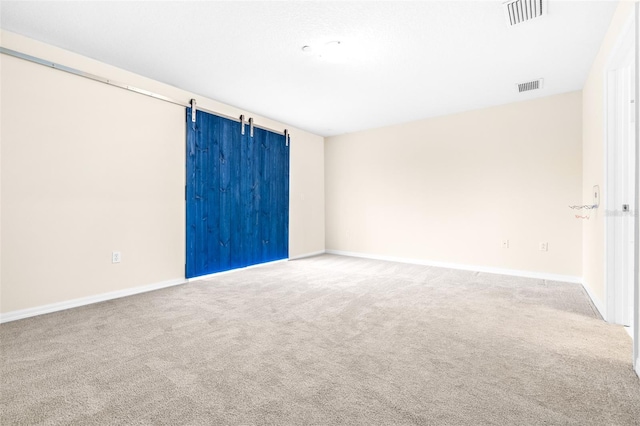 empty room featuring carpet flooring