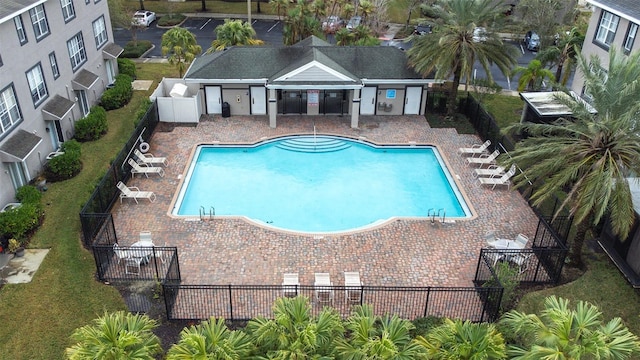 view of swimming pool featuring a patio area