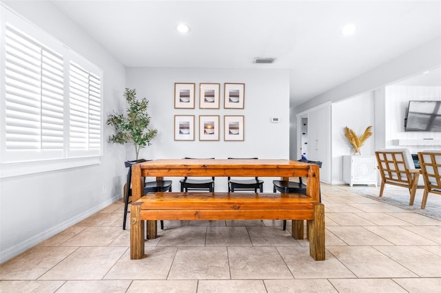 view of tiled dining space