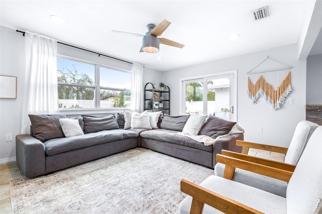 living room featuring ceiling fan