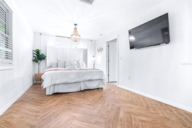 bedroom featuring parquet floors