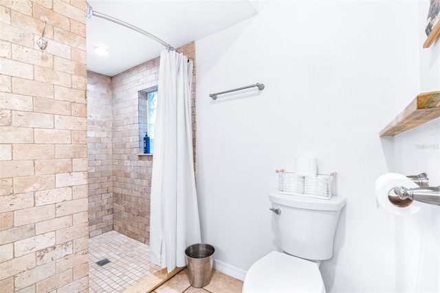 bathroom with a shower with shower curtain and toilet