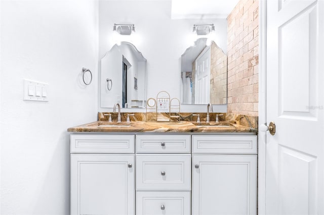 bathroom with vanity and backsplash