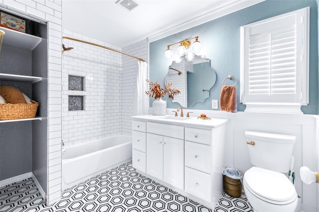 full bathroom with vanity, shower / tub combo with curtain, tile patterned floors, and toilet