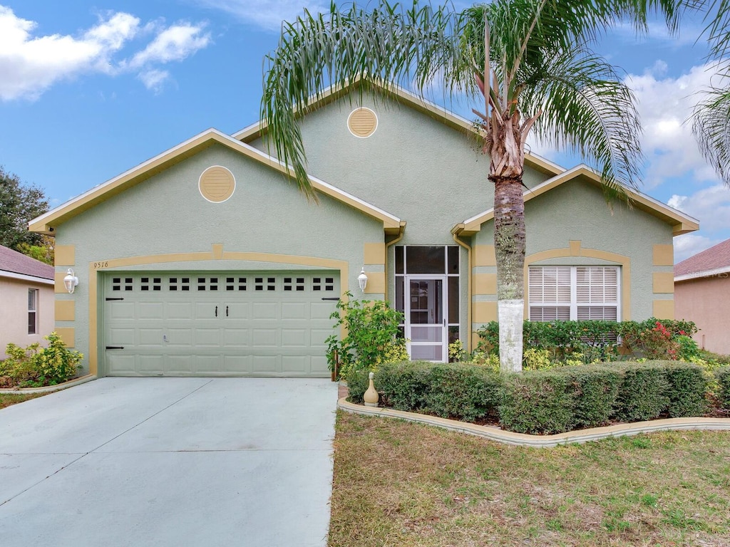 front of property with a garage