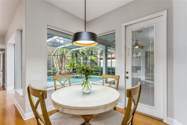 dining room with light wood-type flooring