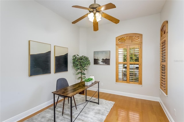 office space featuring ceiling fan and hardwood / wood-style floors