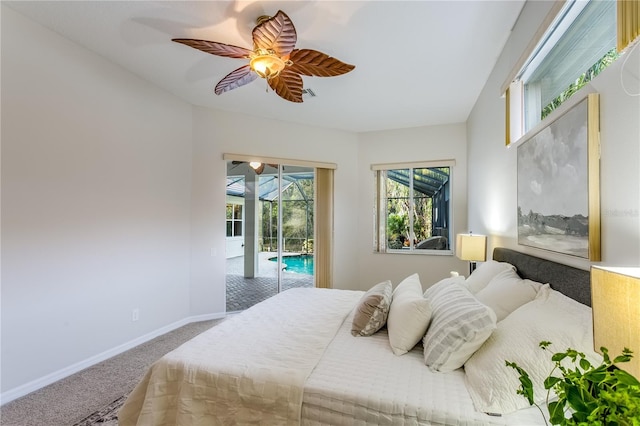 bedroom featuring access to outside, ceiling fan, and carpet flooring