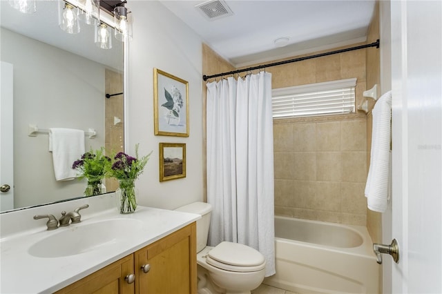 full bathroom with vanity, toilet, and shower / bath combo