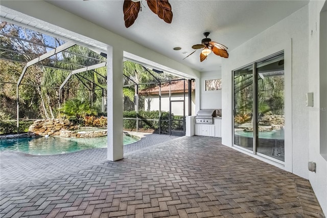 unfurnished sunroom featuring ceiling fan and plenty of natural light