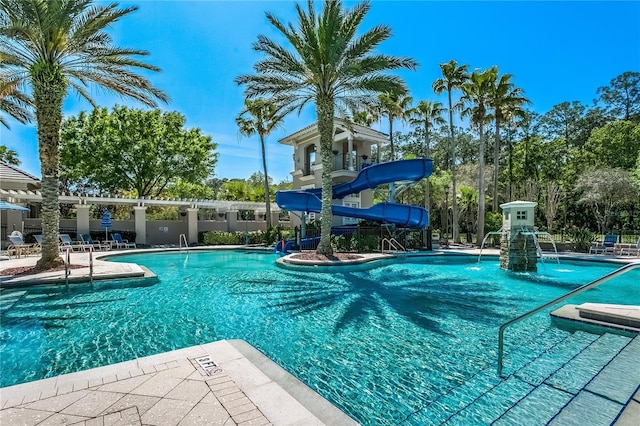 view of pool featuring a water slide