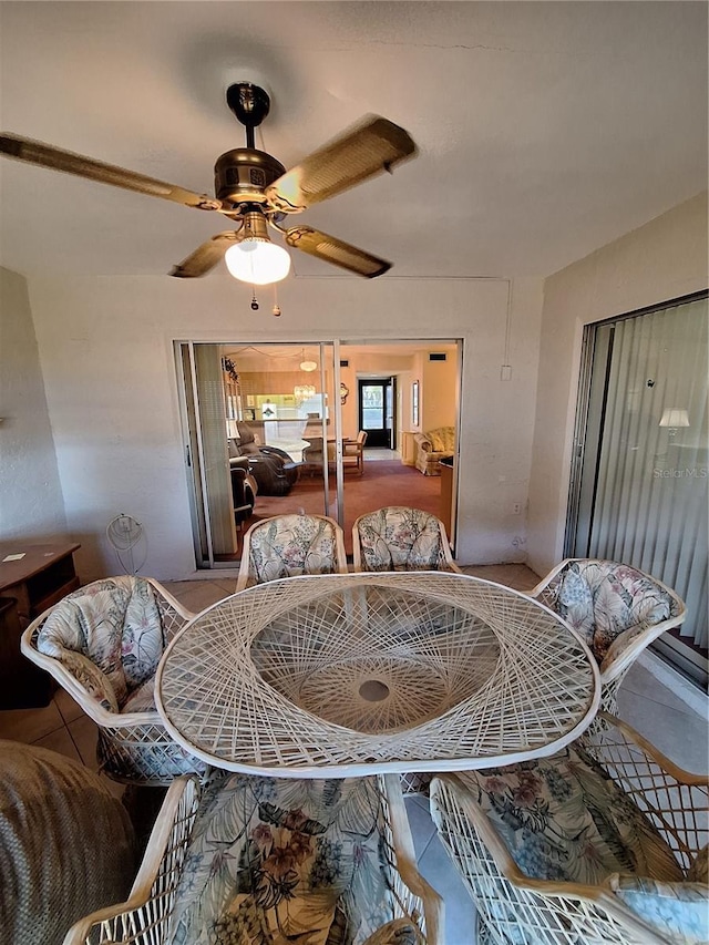 dining room with ceiling fan