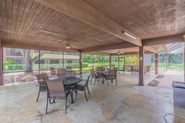 view of patio featuring ceiling fan